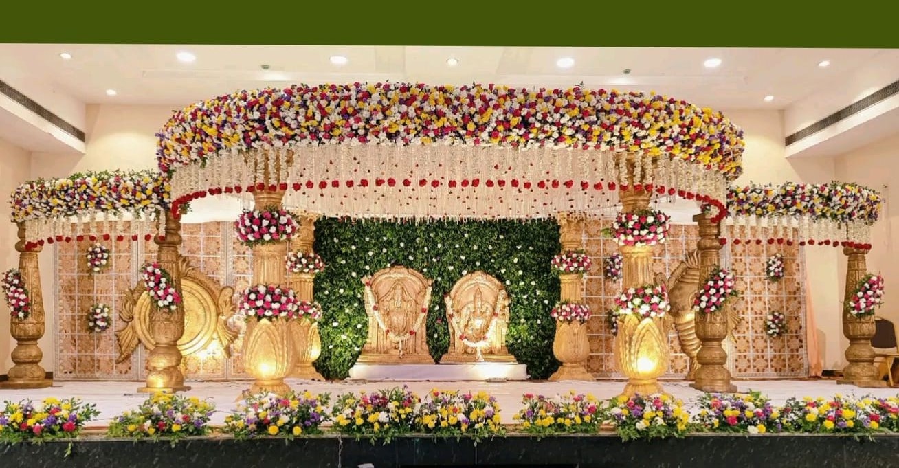 Beautiful traditional wedding stage decoration with floral canopy and elegant mandap-style setup for grand celebrations in Hyderabad.