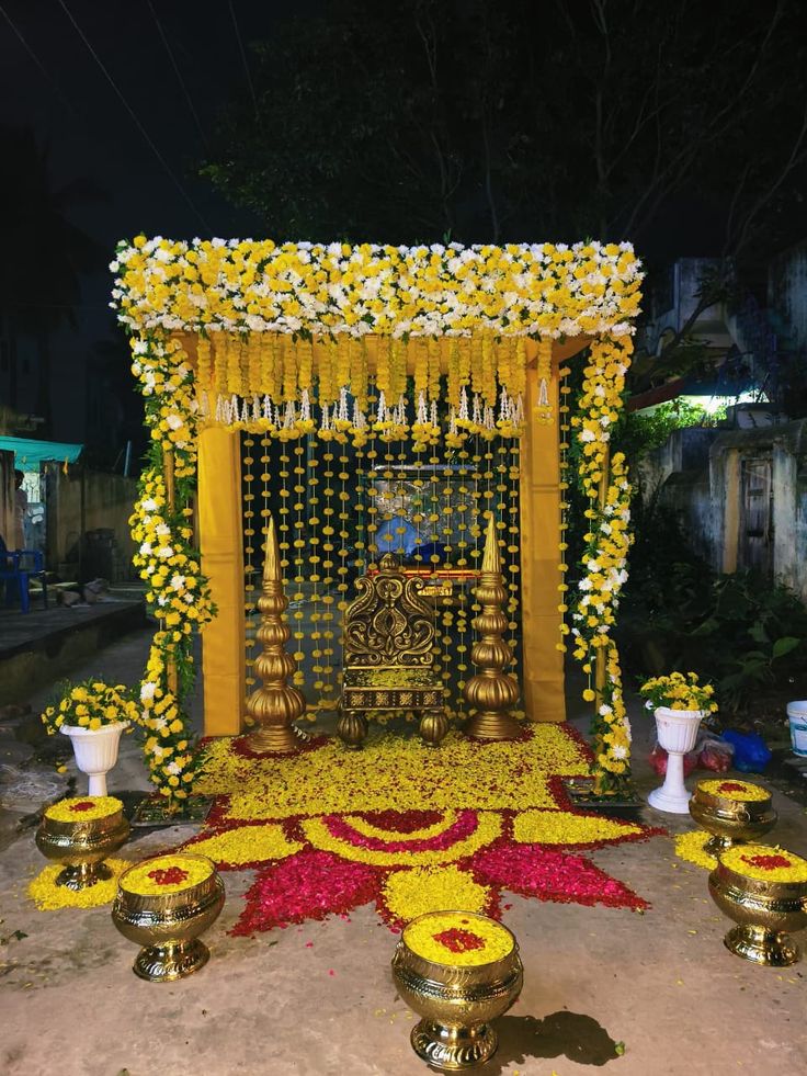 Pellikuthuru swing decoration with yellow floral setup in Hyderabad