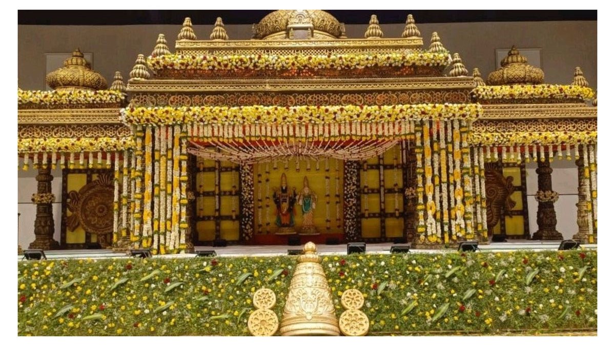 Royal South Indian wedding mandap decoration with temple-style design and floral garlands in Hyderabad.